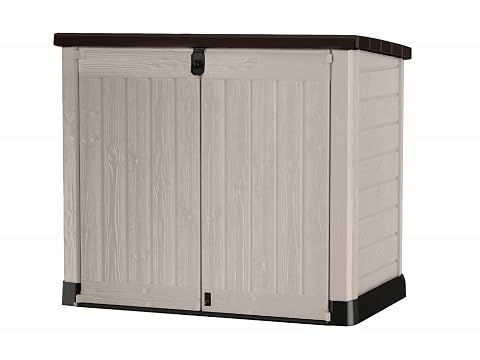 Abri horizontal beige Keter SIO Pro avec deux bacs roulants dans un jardin ordonné
