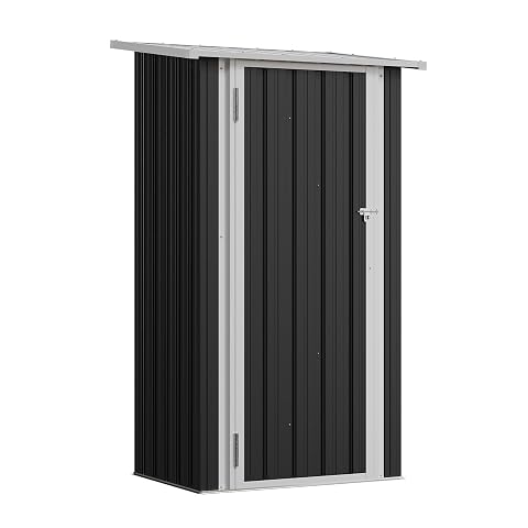 Abri de jardin Aoxun en métal noir avec portes verrouillables et toit incliné, dans un jardin