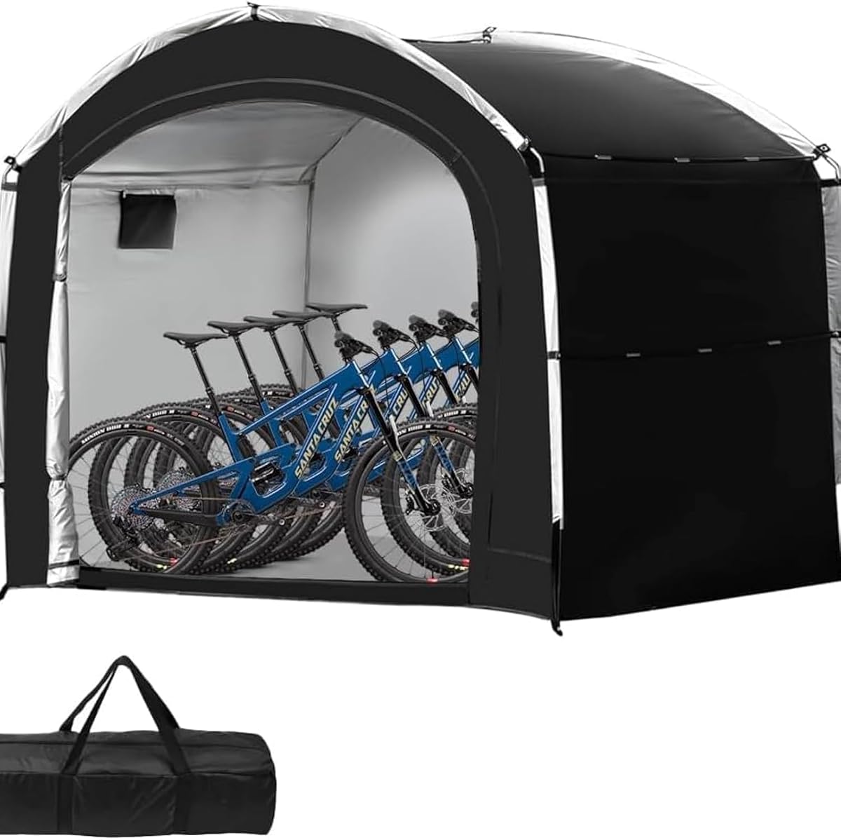 Abri vélo pliable noir installé dans un jardin, avec un vélo rangé à l’intérieur