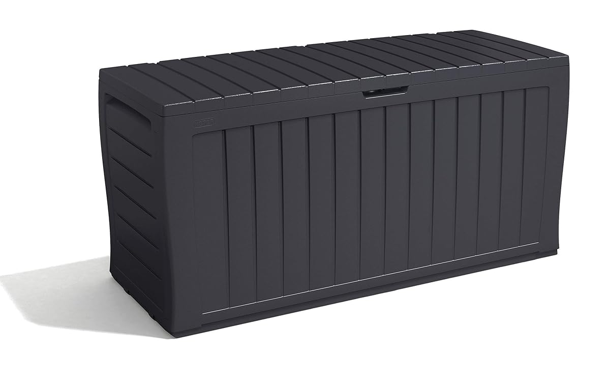 Coffre de jardin Keter Marvel+ gris graphite posé sur une terrasse près de végétation
