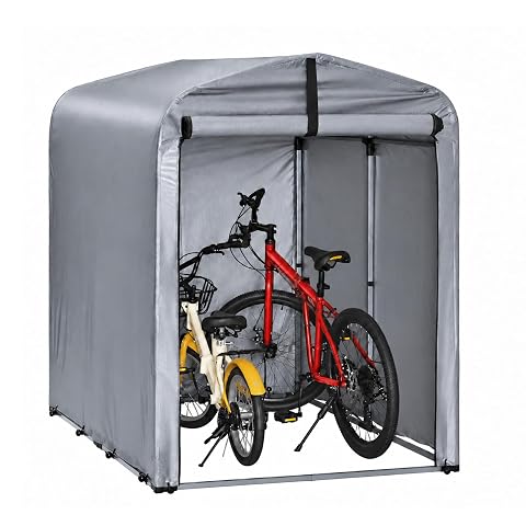 Abri vélo SoBuy en bâche grise installé dans un jardin, avec deux vélos rangés à l’intérieur